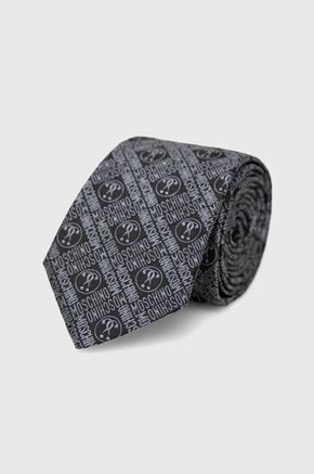 Svilena kravata Moschino siva barva - siva. Kravata iz kolekcije Moschino. Model izdelan iz vzorčaste