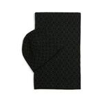 Kapa in šal s primesjo volne Calvin Klein črna barva - črna. Kapa in šal iz kolekcije Calvin Klein. Model izdelan iz vzorčaste pletenine.