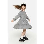 Jeans obleka Coccodrillo siva barva - siva. Otroški obleka iz kolekcije Coccodrillo. Model izdelan iz jeansa. Model je izdelan iz česanega bombaža, zato ga odlikujeta mehak lesk in večja vzdržljivost.