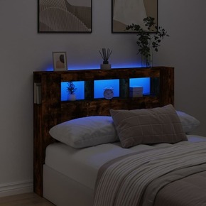 VidaXL LED posteljno vzglavje dimljen hrast 140x18