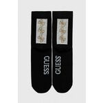 Nogavice Guess ženski, črna barva - črna. Visoke nogavice iz kolekcije Guess. Model izdelan iz elastičnega materiala.