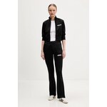 Trenirka adidas Glam - črna. Komplet trenirke iz kolekcije adidas. Model izdelan iz enobarvne pletenine. Poliester zagotavlja večjo odpornost na gubanje.