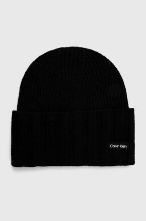 Volnena kapa Calvin Klein črna barva - črna. Kapa iz kolekcije Calvin Klein. Model izdelan iz enobarvnega materiala.