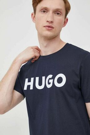 Bombažna kratka majica HUGO mornarsko modra barva - mornarsko modra. Ohlapna kratka majica iz kolekcije HUGO. Model izdelan iz tanke