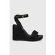 Sandali Tommy Hilfiger TH ROPE HIGH WEDGE SANDAL črna barva, FW0FW07926 - črna. Sandali iz kolekcije Tommy Hilfiger. Model izdelan iz kombinacije tekstilnega materiala in naravnega usnja. Model z mehkim, oblikovanim vložkom zagotavlja udobje.