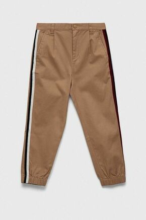 Otroške hlače Tommy Hilfiger bež barva - bež. Otroški hlače iz kolekcije Tommy Hilfiger. Model izdelan iz enobarvne tkanine. Model iz izjemno udobne bombažne tkanine.