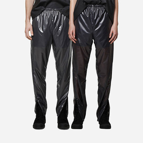 Nepremočljive hlače Rains Ultralight Pants Slim črna barva - črna. Nepremočljive hlače iz kolekcije Rains. Model izdelan iz enobarvne tkanine. Lahek