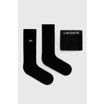 Boksarice in nogavice Lacoste moški, črna barva - črna. Komplet bokserke in nogavice iz kolekcije Lacoste. Model izdelan iz gladke, elastične, udobne pletenine.
