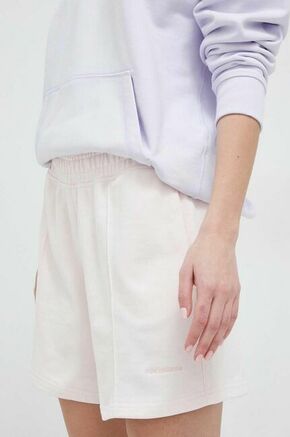 Bombažne kratke hlače New Balance roza barva - roza. Kratke hlače iz kolekcije New Balance. Model izdelan iz bombažne tkanine za udobje in svobodo gibanja.