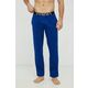 bombažne pižama hlače Tommy Hilfiger - modra. Spodnji del pižame iz kolekcije Tommy Hilfiger. Model izdelan iz elastične pletenine.