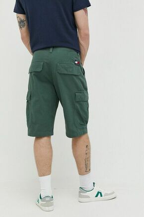 Bombažne kratke hlače Tommy Jeans zelena barva - zelena. Kratke hlače iz kolekcije Tommy Jeans. Model izdelan iz enobarvnega materiala. Bombažen