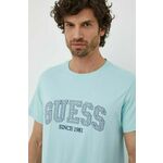 Bombažna kratka majica Guess moški - modra. Kratka majica iz kolekcije Guess, izdelana iz tanke, elastične pletenine. Model iz izjemno udobne, zračne tkanine.
