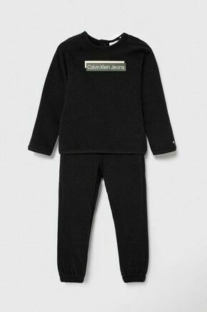 Otroška bombažna trenirka Calvin Klein Jeans črna barva - črna. Komplet trenirke za dojenčka iz kolekcije Calvin Klein Jeans. Model izdelan iz udobnega