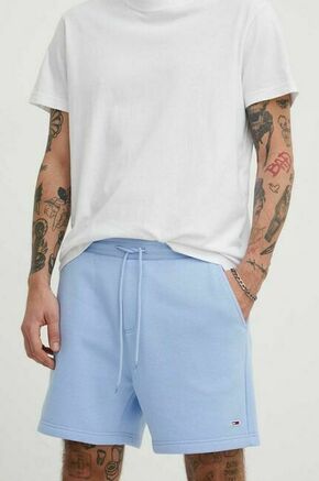 Kratke hlače Tommy Jeans moški - modra. Kratke hlače iz kolekcije Tommy Jeans. Model izdelan iz enobarvnega materiala. Model z mehko oblazinjeno notranjostjo zagotavlja mehkobo in povečuje udobje.