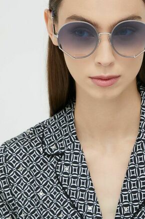 Sončna očala Marc Jacobs ženski - modra. Sončna očala iz kolekcije Marc Jacobs. Model s toniranimi stekli in okvirji iz kombinacije umetne snovi in kovine. Ima filter UV 400.