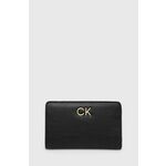 Denarnica Calvin Klein ženski, bež barva - črna. Srednje velika denarnica iz kolekcije Calvin Klein. Model izdelan iz ekološkega usnja.