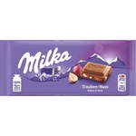 Milka Čokolada z rozinami in lešniki - 100 g