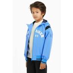 Otroška bomber jakna Tommy Hilfiger - modra. Otroški Bomber jakna iz kolekcije Tommy Hilfiger. Nepodložen model, izdelan iz materiala s potiskom.