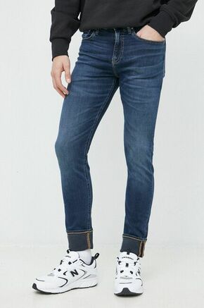 Kavbojke Calvin Klein Jeans moški - mornarsko modra. Kavbojke iz kolekcije Calvin Klein Jeans v stilu skinny s nizkim pasom. Model izdelan iz spranega denima.