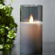 Siva LED sveča iz voska v steklu Star Trading M-Twinkle, višina 15 cm